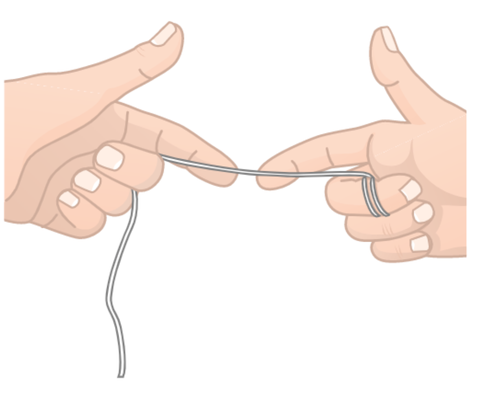 Fare passare il filo delicatamente tra i denti alzandolo e abbassandolo